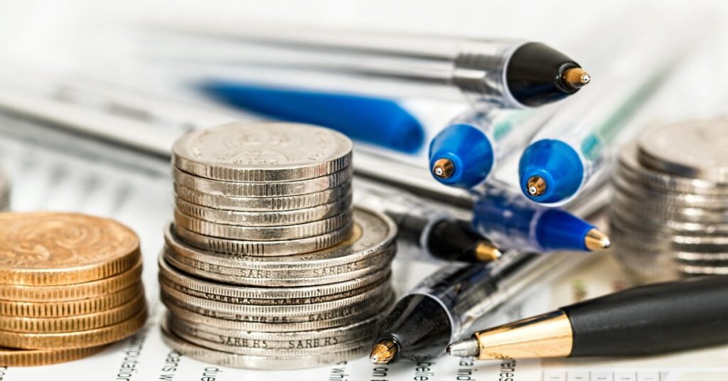 The featured image represents long-term income investing through dividend stocks, highlighting blue-chip companies, consumer staples, and materials sector investments that generate steady cash flow and portfolio stability over time.